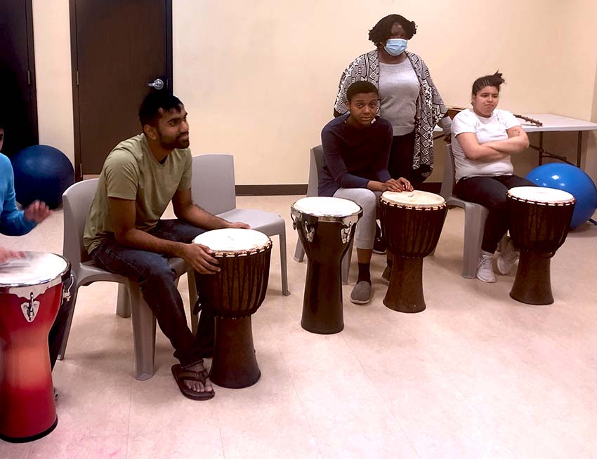 Residents enjoying hand drumming